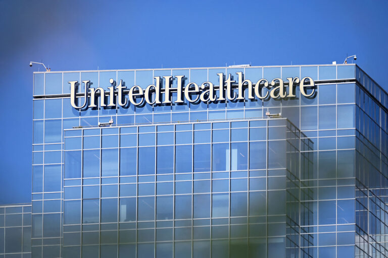 UnitedHealthcare (UHC) health insurance company signage is displayed on an office building in Phoenix, Arizona on July 19, 2023. (PATRICK T. FALLON/AFP via Getty Images)