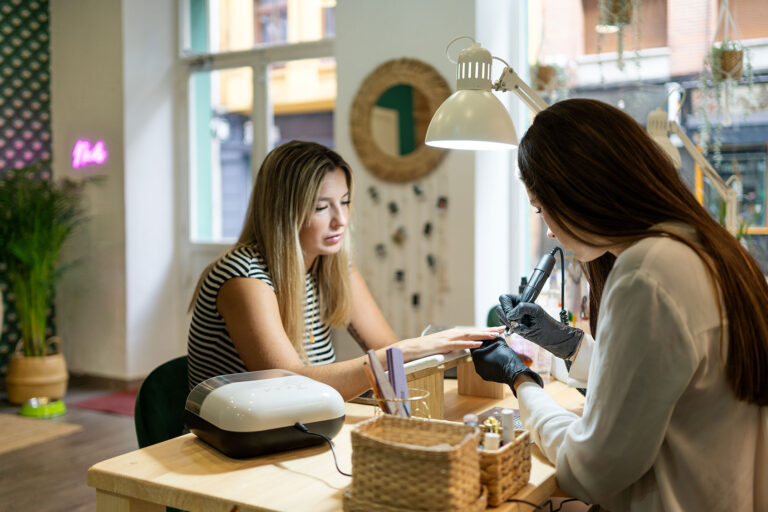 Woman sitting getting a manicure (Getty Images/ABRAHAM GONZALEZ FERNANDEZ)