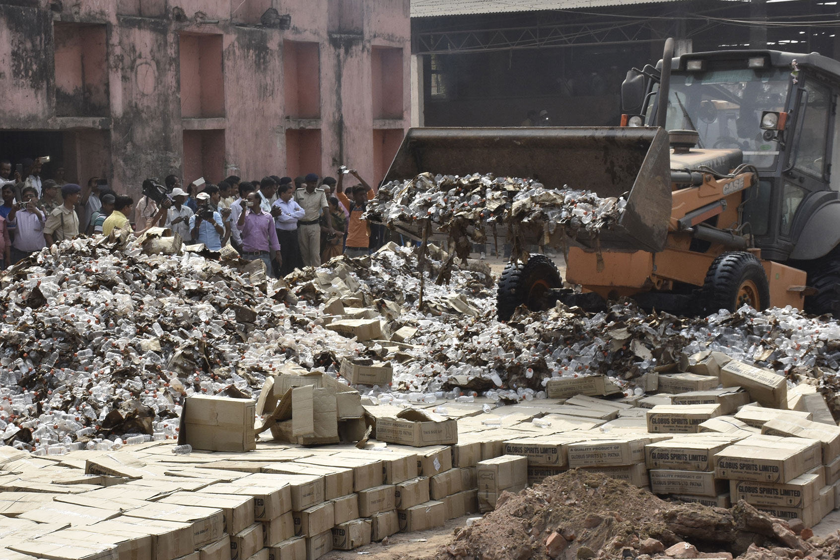 Bottles of liquor being destroyed Liquor Ban Bihar India