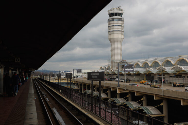 The control tower at Ronald Reagan National Airport as seen from a Metro train stop in Washington, DC. (Photo by Chip Somodevilla/Getty Images)