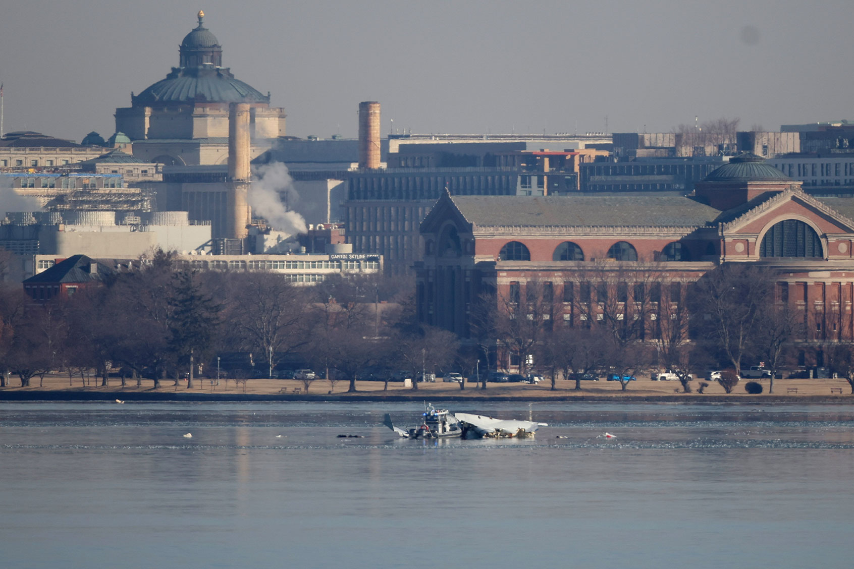 Emergency response units search the crash site of the American Airlines plane on the Potomac River after the plane crashed last night on approach to Reagan National Airport on January 30, 2025 in Arlington, Virginia. (Tasos Katopodis/Getty Images)