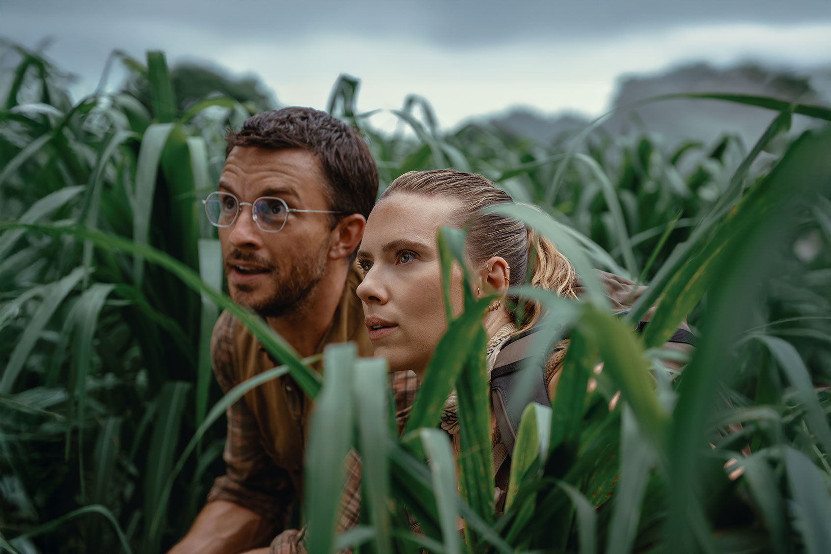 Jonathan Bailey as Dr. Henry Loomis and Scarlett Johansson as Zora Bennett in "Jurassic World Rebirth" (Jasin Boland/Universal Pictures and Amblin Entertainment)