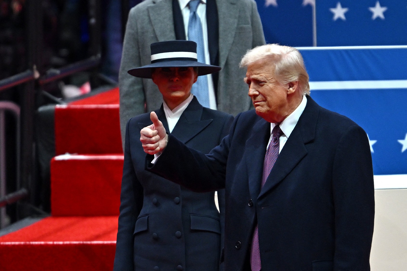 U.S. President Donald Trump and U.S. First Lady Melania Trump inside Capital One Arena, in Washington, DC, on January 20, 2025. (ANGELA WEISS/AFP via Getty Images)
