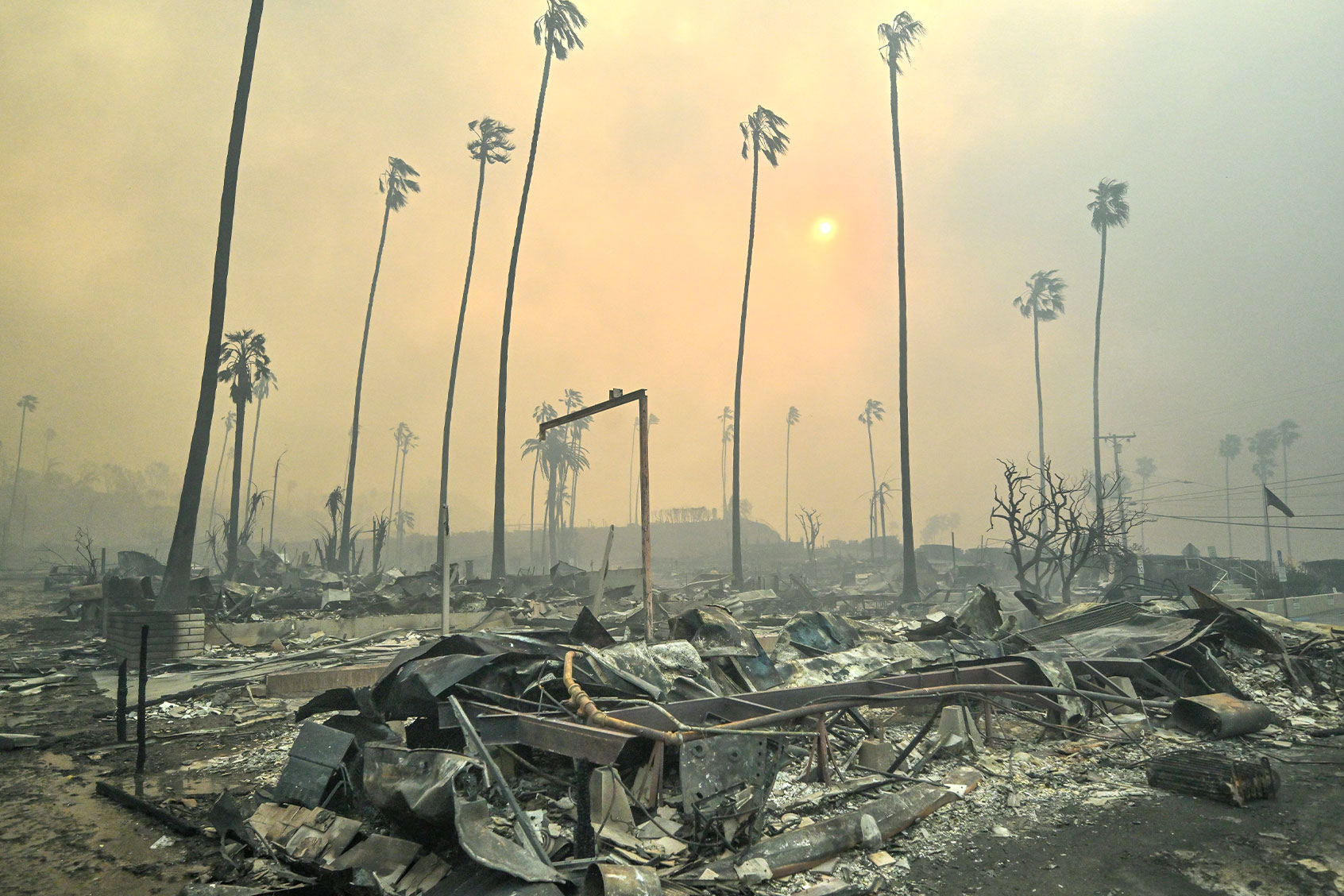 A mobile home park is destroyed along Pacific Coast Highway during the Palisades Fire on Wednesday, January 8, 2025, in Pacific Palisades, CA. (Jeff Gritchen/MediaNews Group/Orange County Register via Getty Images)