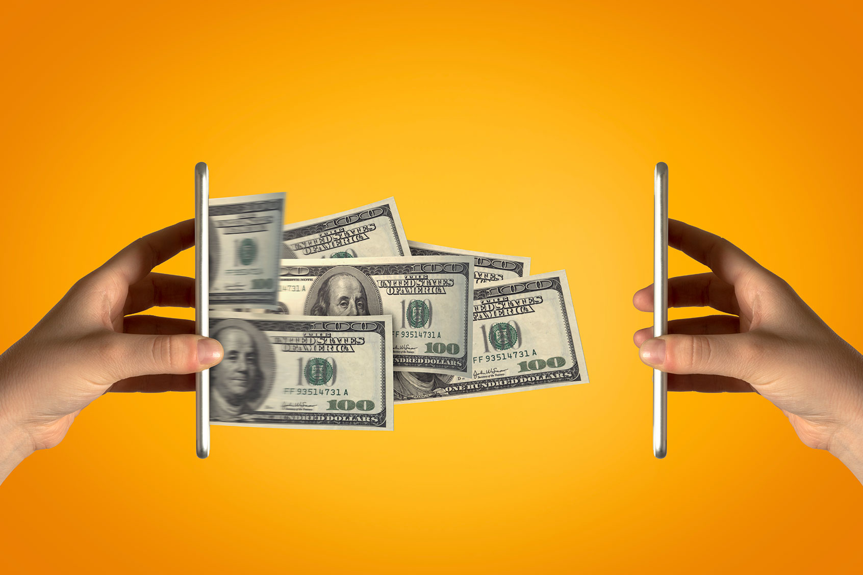 Sending money through phones (Getty Images/sefa ozel)