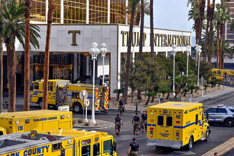 Clark County fire vehicles surround the valet area where a Cybertruck caught fire at the Trump International Hotel on January 1, 2025, in Las Vegas, Nevada. (David Becker for the Washington Post)