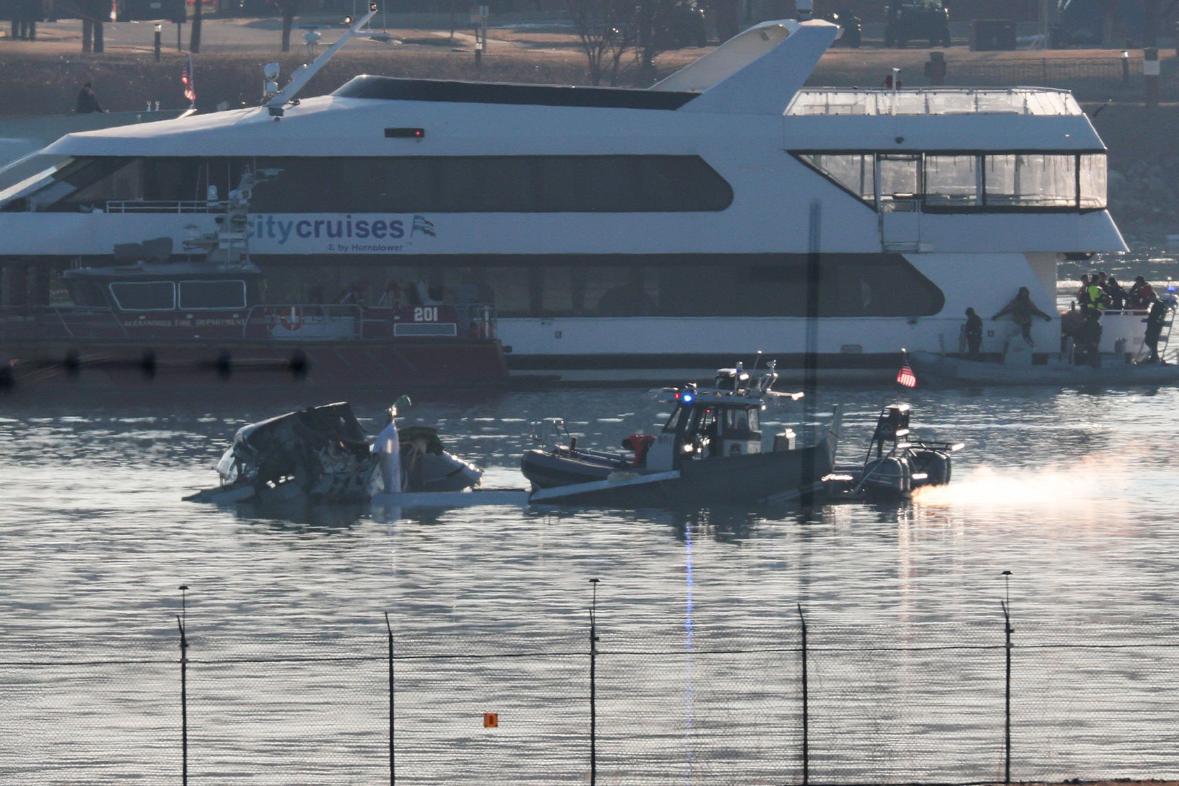 Emergency response units search the crash site of the American Airlines plane on the Potomac River after the plane crashed on approach to Reagan National Airport on January 30, 2025 in Arlington, Virginia. (Win McNamee/Getty Images)