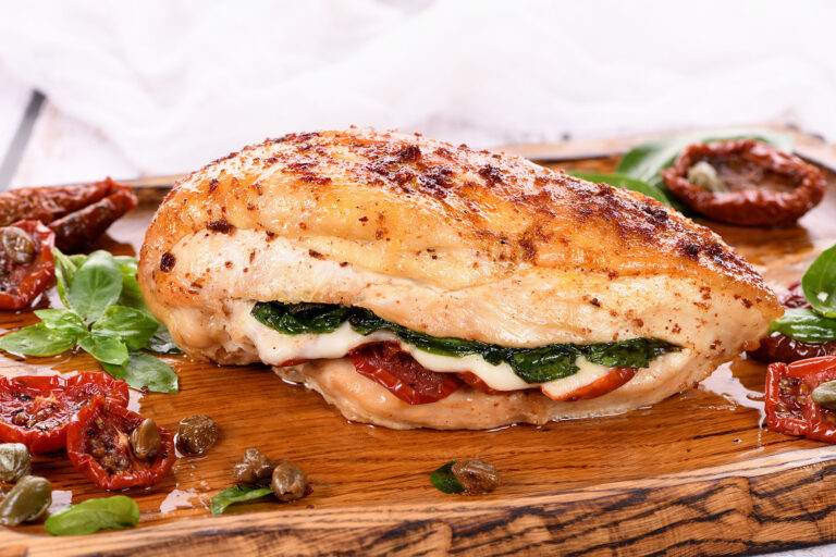Baked chicken breast with spinach, sun-dried tomatoes and mozzarella (Getty Images/marina200707/500px)