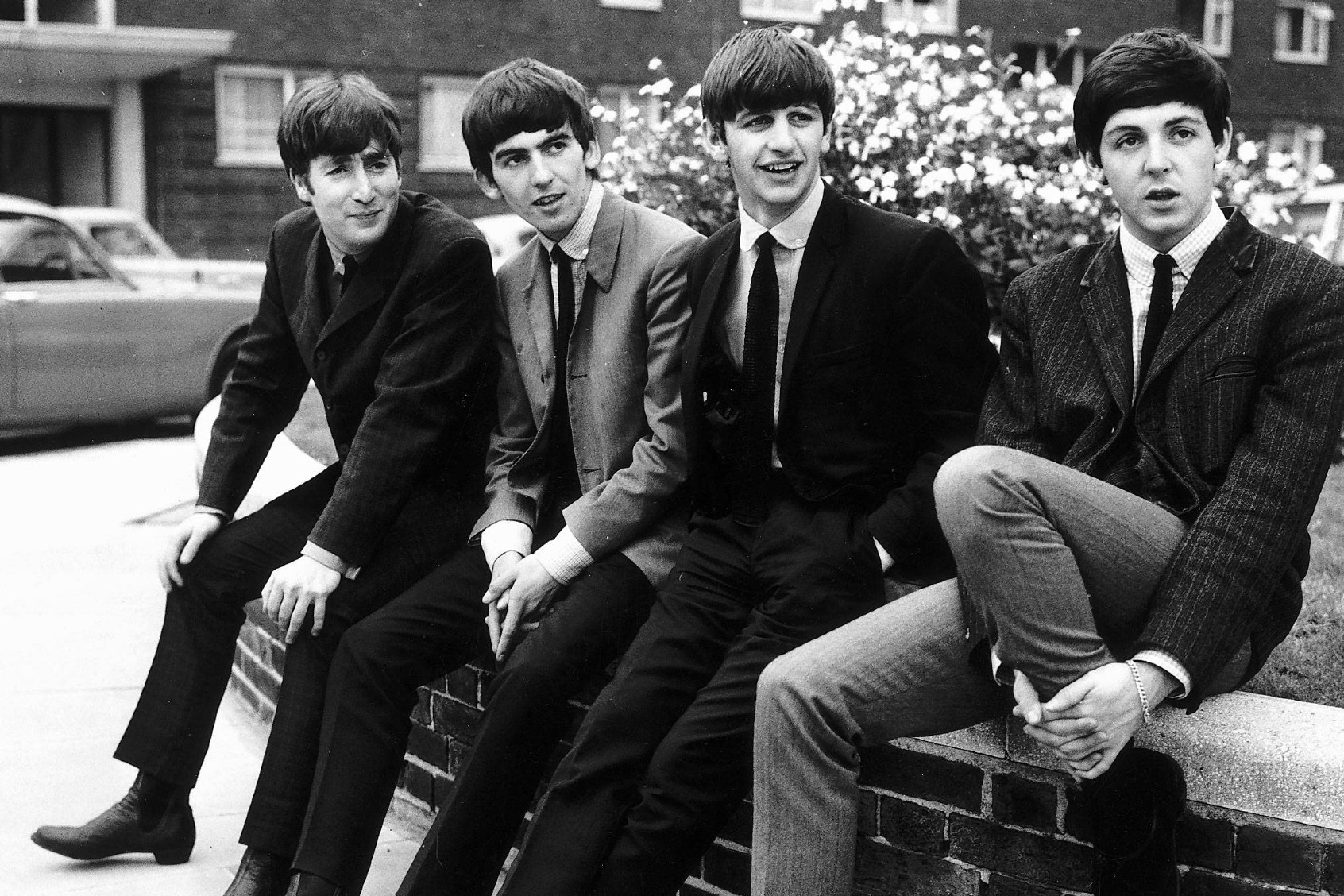 The Beatles, pose for pictures after being interviewed by Donald Zec, Daily Mirror Journalist, at his Flat in Maitland Court, Lancaster Terrace, London. 9th September 1963. (Bela Zola/Daily Mirror/Mirrorpix via Getty Images)