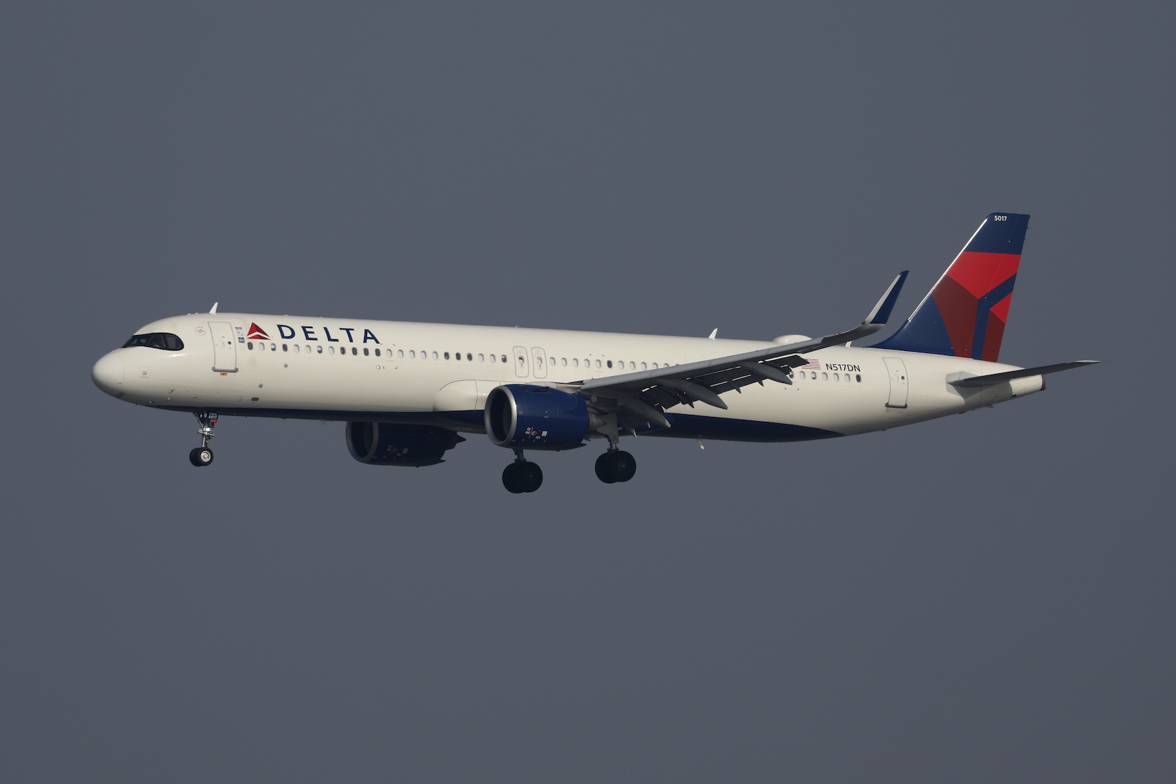 A Delta Airlines Airbus A321-271NX aircraft approaches Los Angeles International Airport (LAX) for a landing from Orlando on January 4, 2025 in Los Angeles, California. (Photo by Kevin Carter/Getty Images)