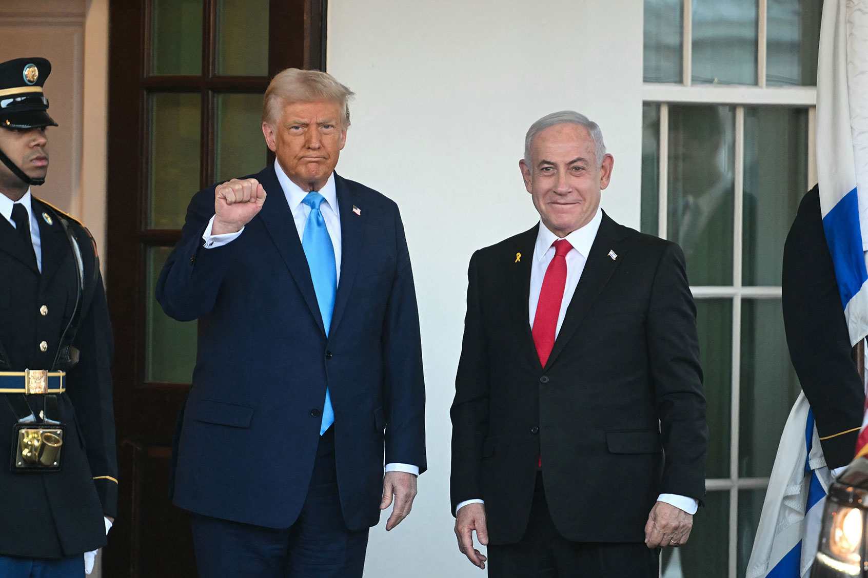 US President Donald Trump greets Israel's Prime Minister Benjamin Netanyahu as he arrives at the North Portico of the White House in Washington, DC, on February 4, 2025. (JIM WATSON/AFP via Getty Images)