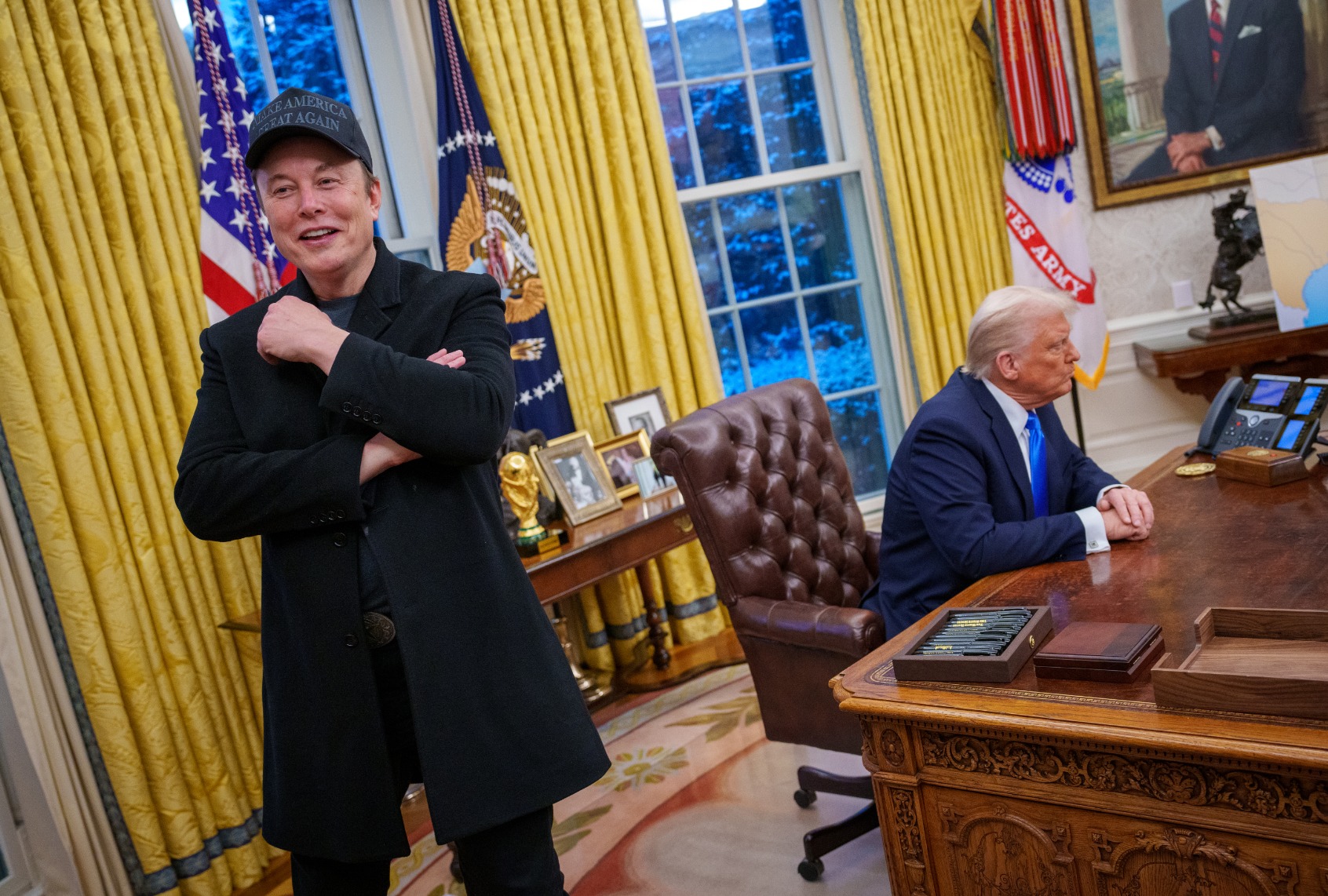 Tesla and SpaceX CEO Elon Musk and President Donald Trump appear during an executive order signing in the Oval Office at the White House on February 11, 2025 in Washington, DC. (Andrew Harnik/Getty Images)