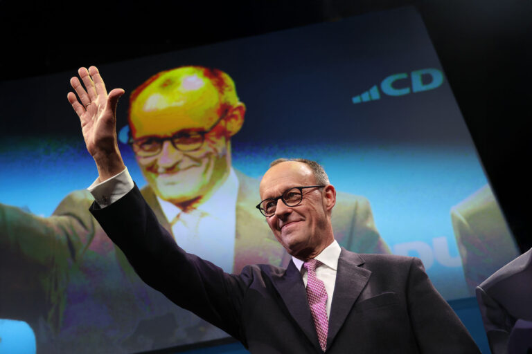 Friedrich Merz, chancellor candidate of Germany's Christian Democrats (CDU/CSU), waves as he arrives to speak to voters during an election campaign tour stop on February 18, 2025 in Potsdam, Germany. (Sean Gallup/Getty Images)