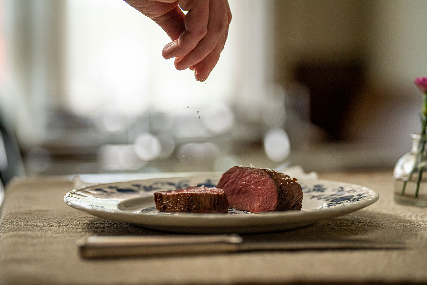 Chef Karyn Tomlinson puttin the finishing touches on a dish at Myriel