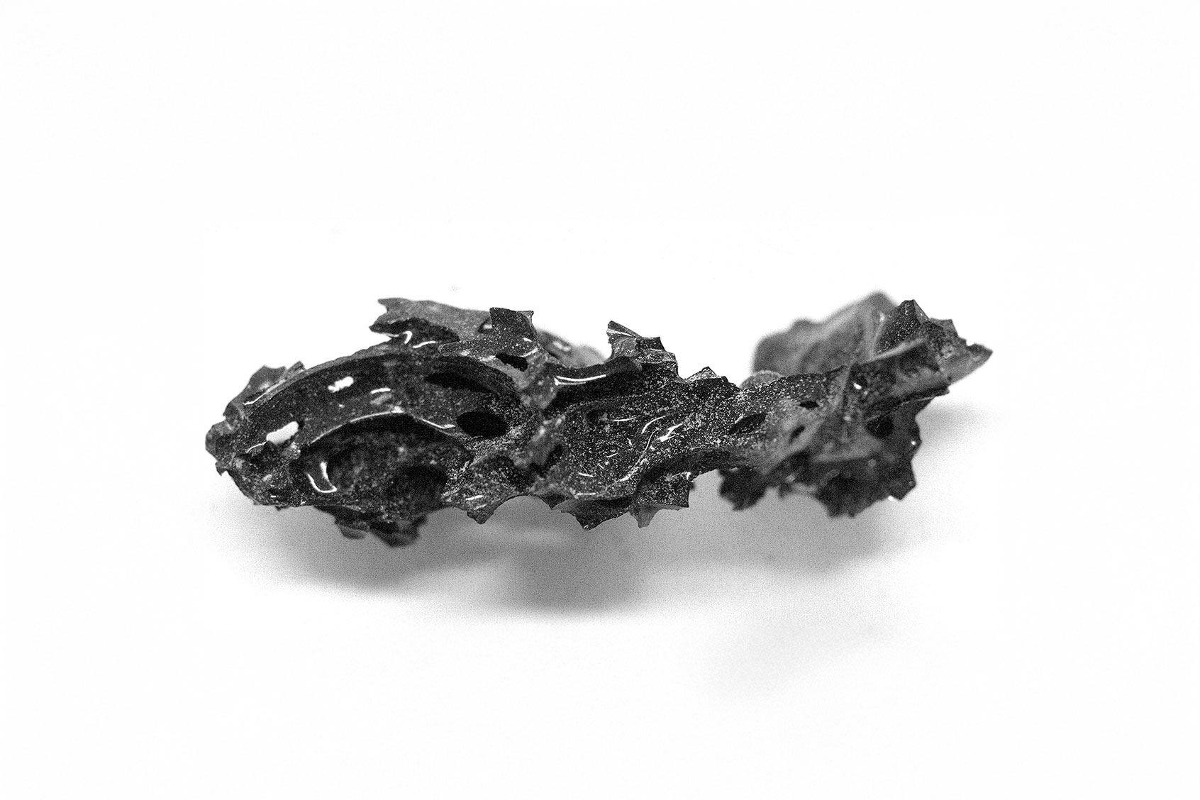 A fragment of the organic glass found inside the skull of the deceased individual in Herculaneum.