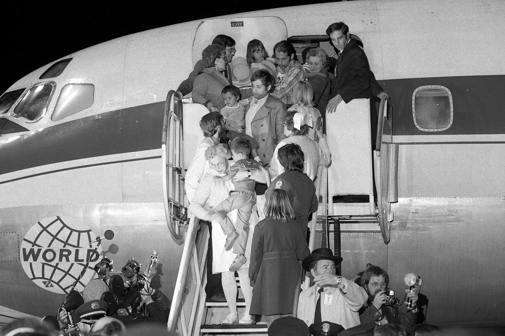 52 Vietnamese orphans arrive in a World Airways plane at Oakland Airport as part of Operation Babylift, on April 2, 1975. (Jerry Telfer/San Francisco Chronicle via Getty Images)