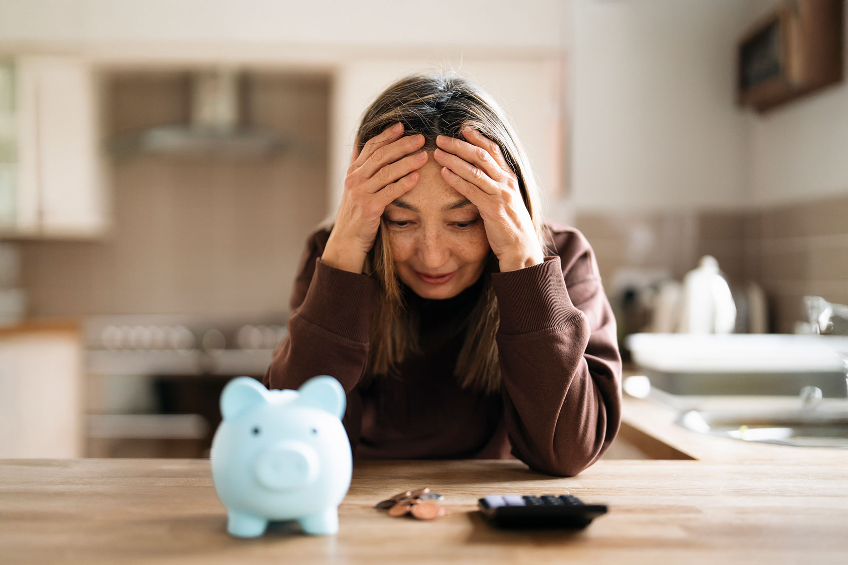 Woman stressed about finances (Getty Images/Iryna Melnyk)