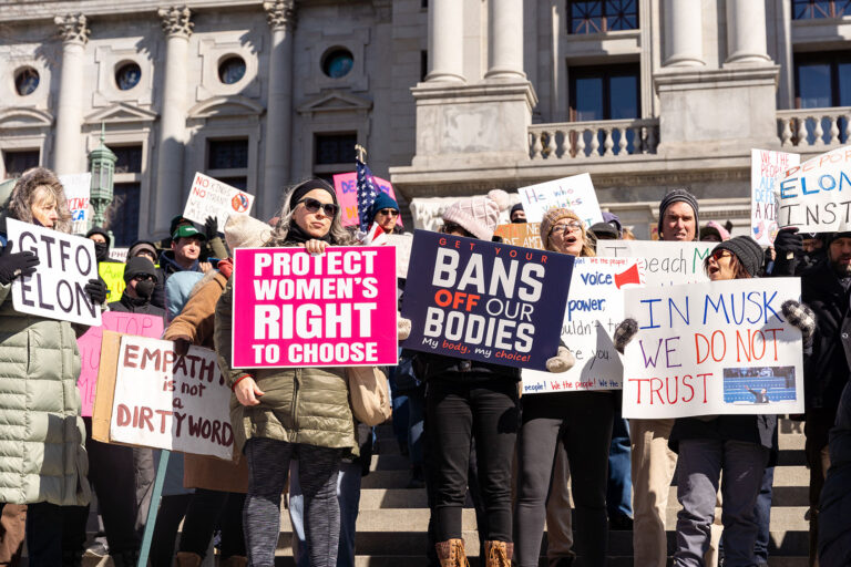 Protesters rally against President Donald Trump on President's Day outside the Pennsylvania State Capitol in Harrisburg, Pennsylvania, United States, on February 17, 2025. (Nathan Morris/NurPhoto via Getty Images)