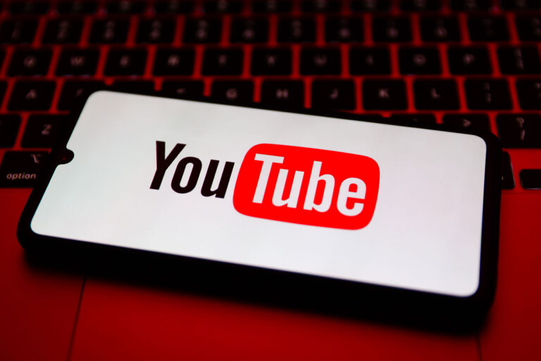 YouTube logo is displayed on a mobile phone (Beata Zawrzel/NurPhoto via Getty Images)