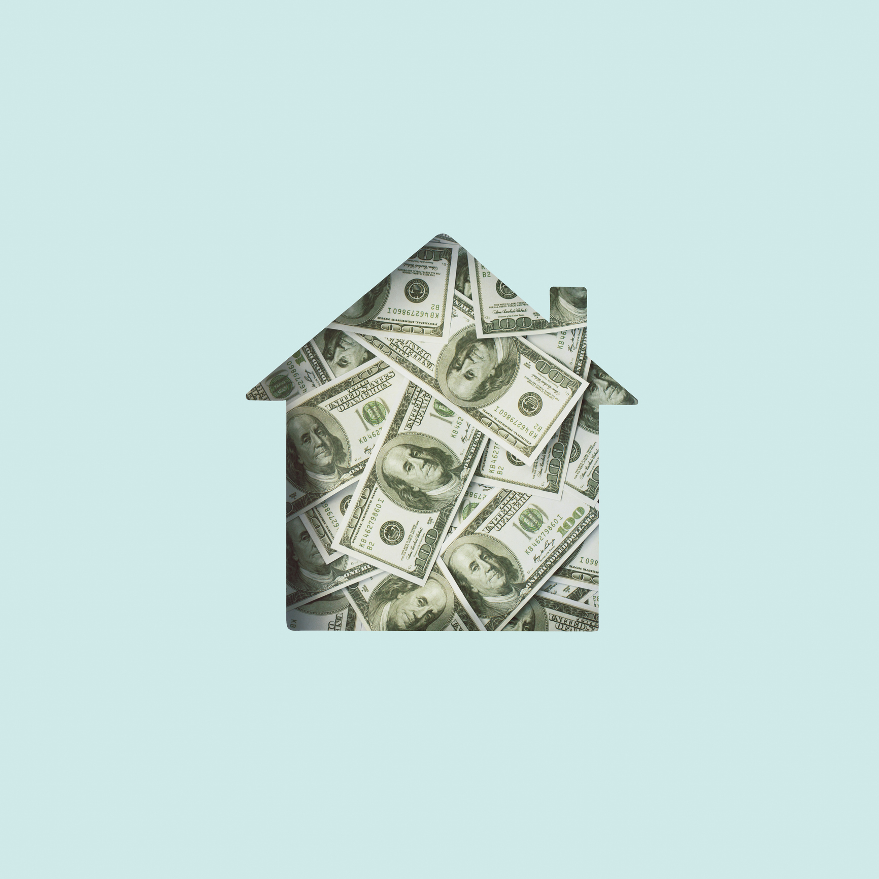House cut out, filled with money (Hidden Catch/Getty Images)