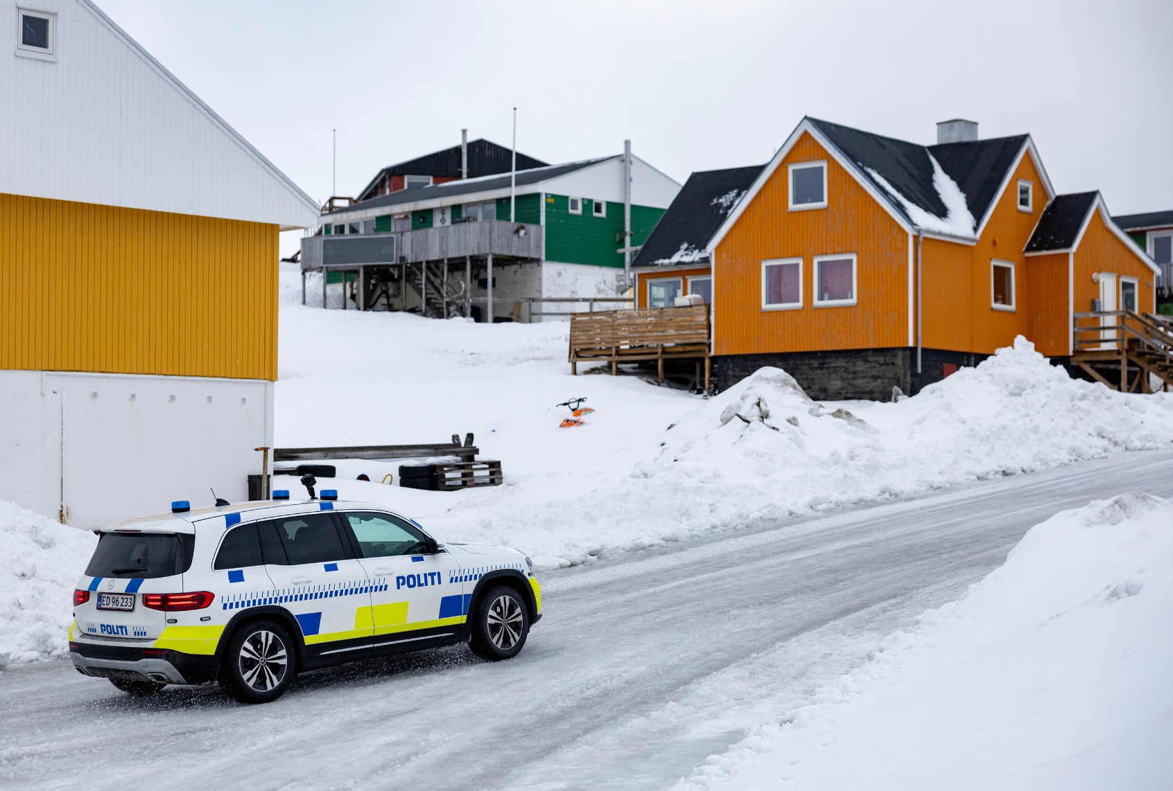 A police car patrols a road in Nuuk, Greenland, on March 9, 2025. (ODD ANDERSEN/AFP via Getty Images)