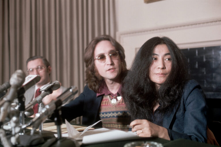 John Lennon, a former "Beatle" with wife, Yoko Ono, during a press conference on April 2, 1973. (Bettmann / Getty Images)