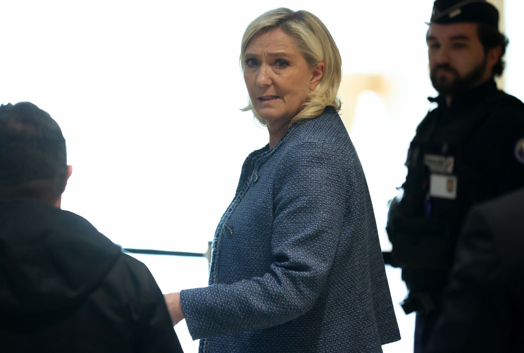 French far-right Leader Marine Le Pen leaves the courtroom after a guilty verdict in her embezzlement case trial on March 31, 2025 in Paris, France. (Tom Nicholson/Getty Images)