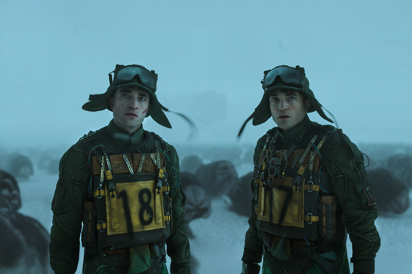Robert Pattinson as Mickey 18 and Robert Pattinson as Mickey 17 in “MICKEY 17” (Courtesy of Warner Bros. Pictures)