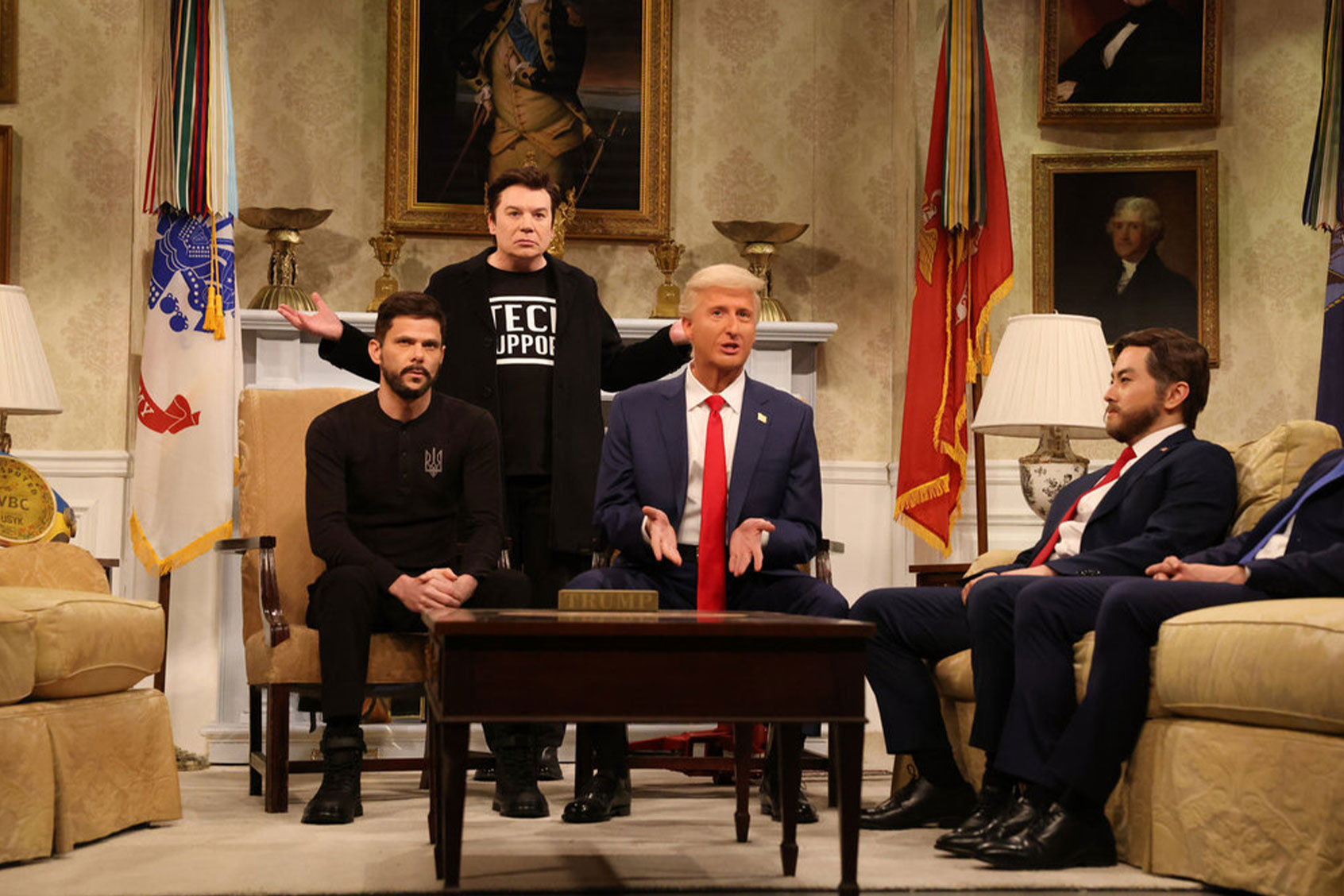 Mikey Day as Ukraine President Zelensky, special guest Mike Myers as Elon Musk, James Austin Johnson as Donald Trump, and Bowen Yang as JD Vance during the "Elon Musk" Cold Open on the March 1, 2025 episode of "Saturday Night Live" (Will Heath/NBC)
