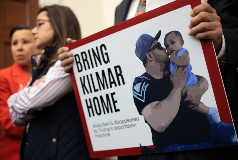A member of the Congressional Hispanic Caucus holds a picture of Kilmar Abrego Garcia during a news conference to discuss Abrego Garcia's arrest and deportation at the Cannon House Office Building on April 9, 2025 in Washington, DC. (Alex Wong/Getty Images)