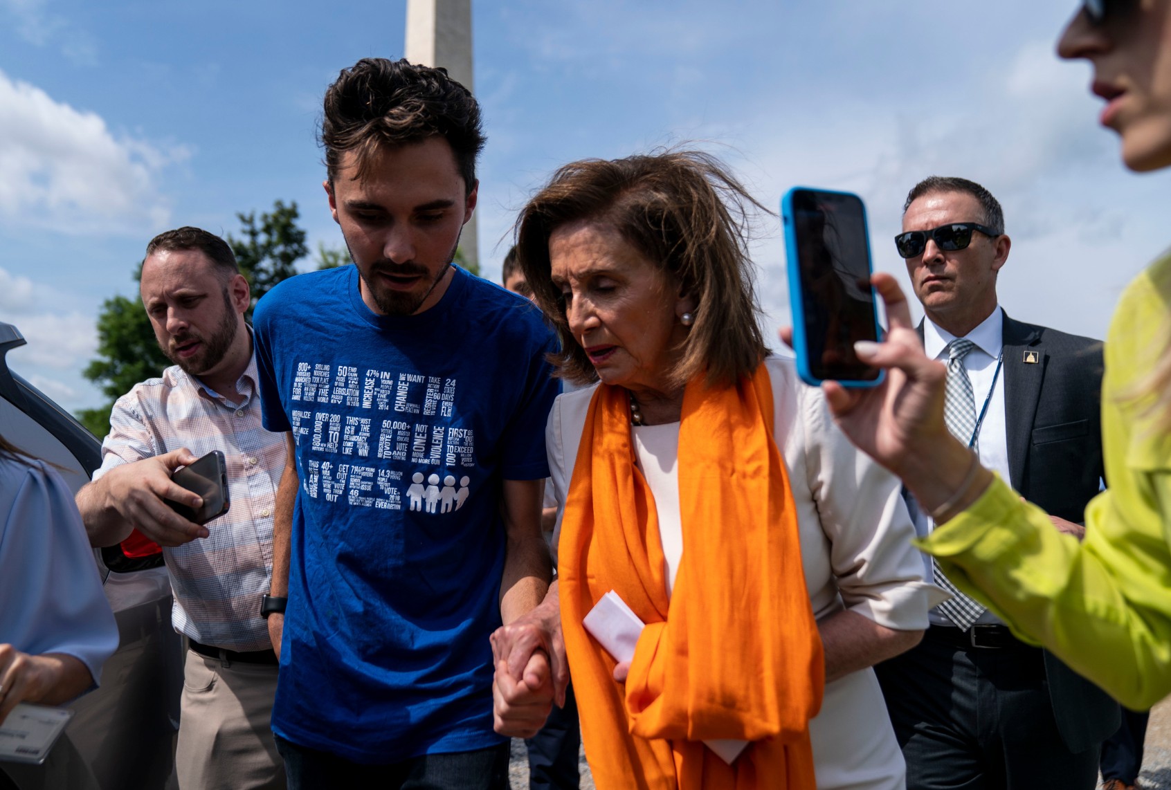 Former Speaker of the House Nancy Pelosi, D-Calif., is greeted by David Hogg while leaving an event at the Gun Violence Memorial in front of the Washington Monument on Tuesday, June 7, 2022 in Washington, DC. (Kent Nishimura / Los Angeles Times via Getty Images)