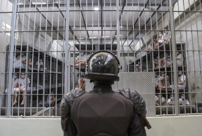 A prison officer guards a cell at maximum security penitentiary CECOT (Center for the Compulsory Housing of Terrorism) on April 4, 2025 in Tecoluca, San Vicente, El Salvador. (Alex Peña/Getty Images)