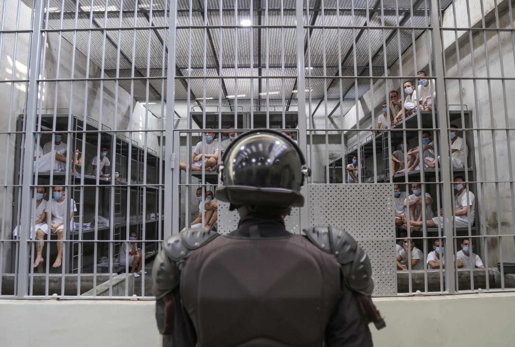 A prison officer guards a cell at maximum security penitentiary CECOT (Center for the Compulsory Housing of Terrorism) on April 4, 2025 in Tecoluca, San Vicente, El Salvador. (Alex Peña/Getty Images)