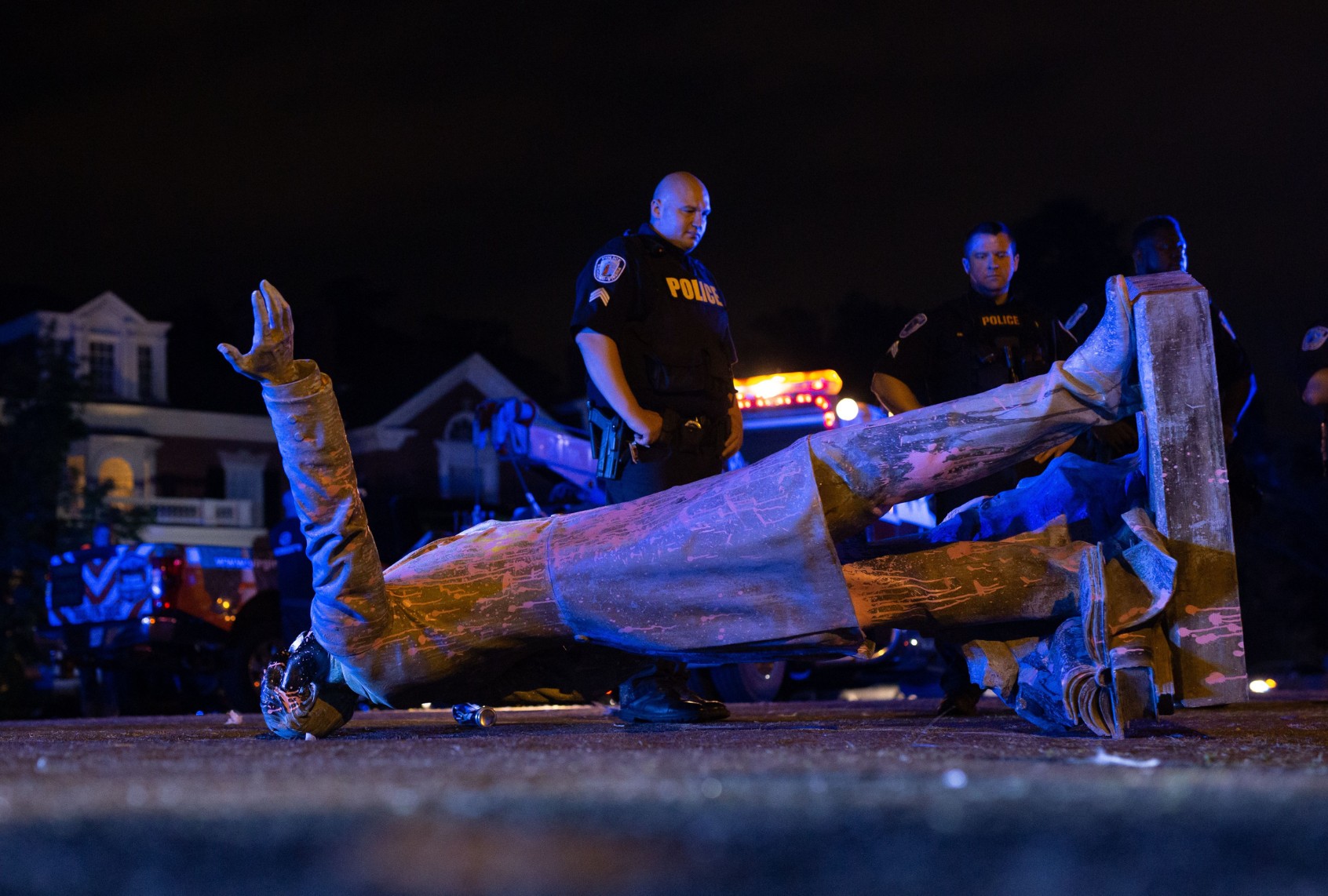 A statue of Confederate States President Jefferson Davis lies on the street after protesters pulled it down in Richmond, Virginia, on June 10, 2020. (PARKER MICHELS-BOYCE/AFP via Getty Images)