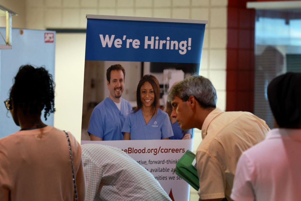 Job seekers attend the JobNewsUSA.com South Florida Job Fair held at the Amerant Bank Arena on June 26, 2024 in Sunrise, Florida. (Getty Images/Joe Raedle)