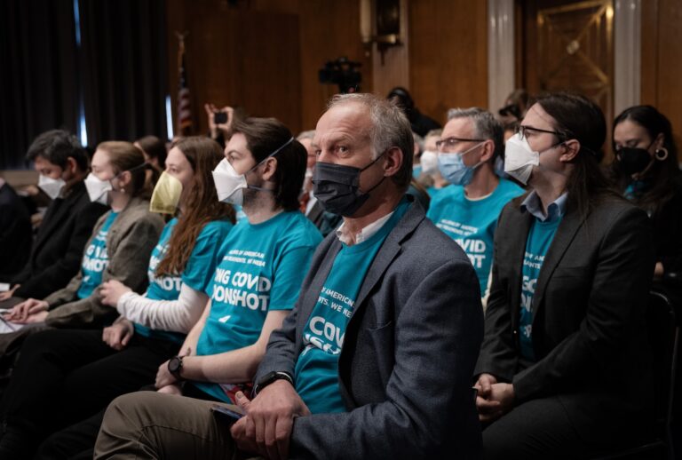 People with symptoms of long Covid sit in the audience as they listen during a Senate Committee on Health, Education, Labor and Pensions hearing titled "Addressing Long COVID: Advancing Research and Improving Patient Care" on Capitol Hill January 18, 2024 in Washington, DC. The hearing focused on long Covid research and patient care. (Photo by Drew Angerer/Getty Images)
