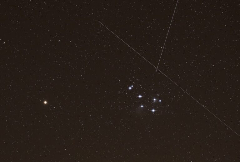 Seine et Marne on march the 6th 2021 at night. Taurus constellation. On this image we can see the effect of the movements of artificial satellites through the sky. On the left we can see the planet Mars, on the right the famous stars cluster the Pleiades (M45). From the bottom right the luminous trail of the satellite STARLINK-1269, and from the top the luminous trail of the satellite STARLINK-1577. (Christophe Lehenaff / Getty Images)