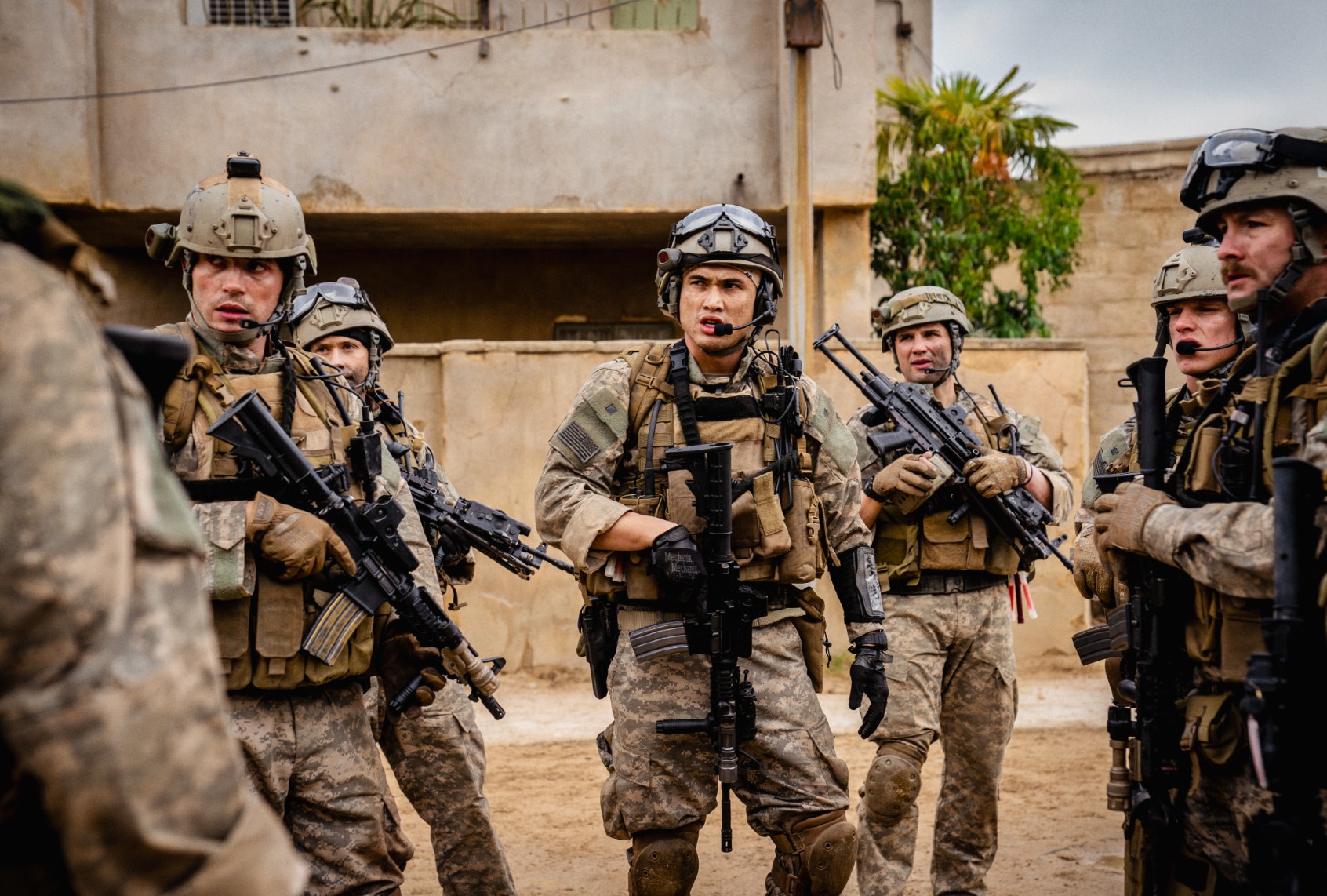 Taylor John Smith, Charles Melton and Alex Brockdorff in "Warfare" (Murray Close/A24)