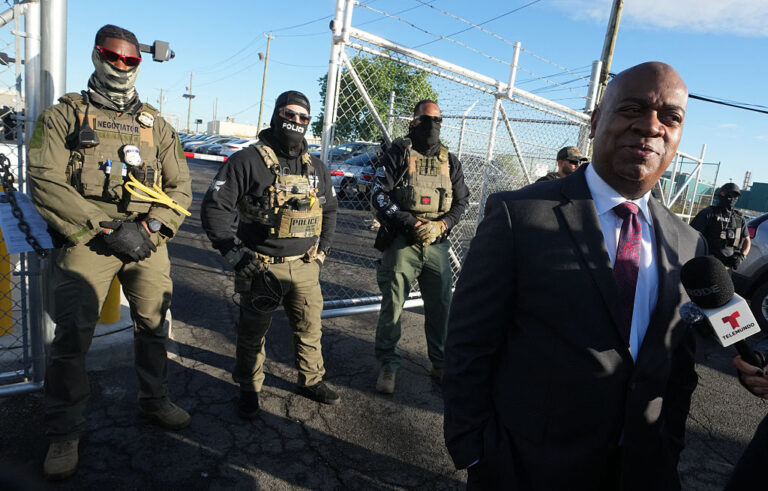 Mayor Ras Baraka of Newark speaks to the press near ICE agents at a demonstration outside an immigrant detention centre in Elizabeth, New Jersey May 7, 2025. (Getty Images/Timothy A. Clary)