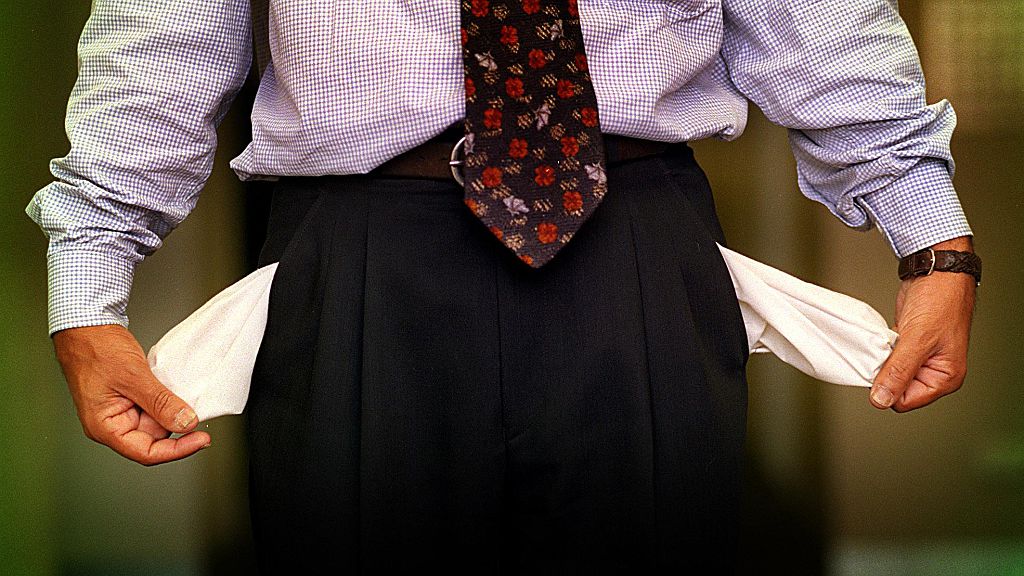Generic picture of a businessman displaying empty pockets (Getty Images/The AGE)