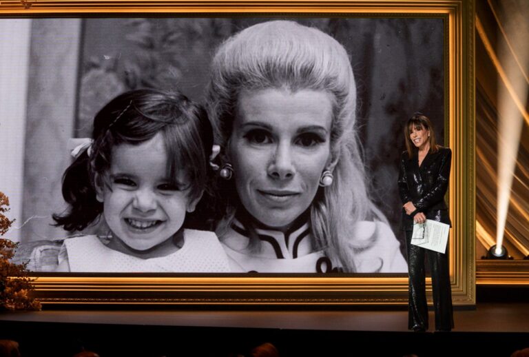 Melissa Rivers stands near a photo of her and her mom, Joan Rivers, during "Joan Rivers: A Dead Funny All-Star Tribute." (Peter Kramer/NBC)