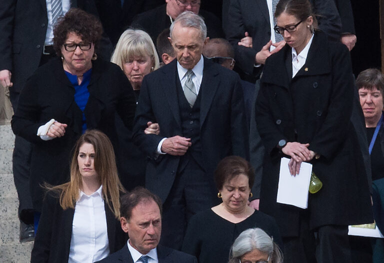US Supreme Court Justice Sonia Sotomayor (L) walks with retired justice David Souter out of the Basilica of the National Shrine of the Immaculate Conception after the funeral service for Justice Antonin Scalia on February 20, 2016 (NICHOLAS KAMM/AFP via Getty Images)