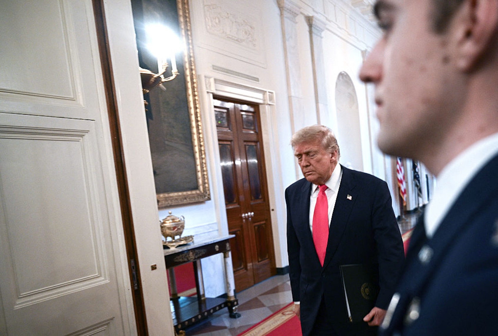President Donald Trump arrives at the "One, Big, Beautiful Event" in the East Room of the White House on June 26, 2025. (BRENDAN SMIALOWSKI/AFP via Getty Images)