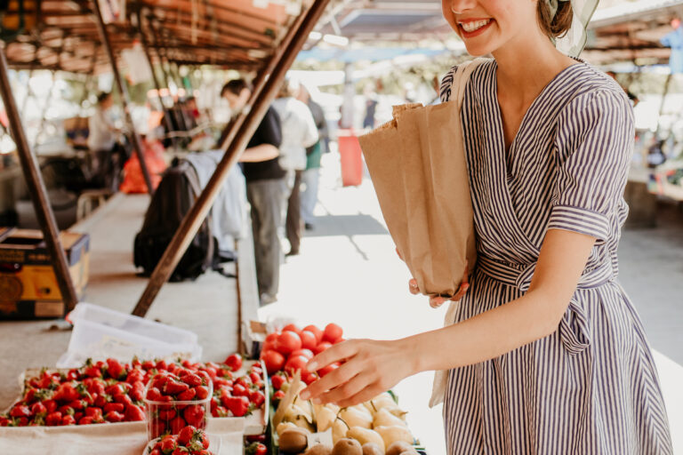 A "tomato girl" at the market (Studio4/Getty Images )