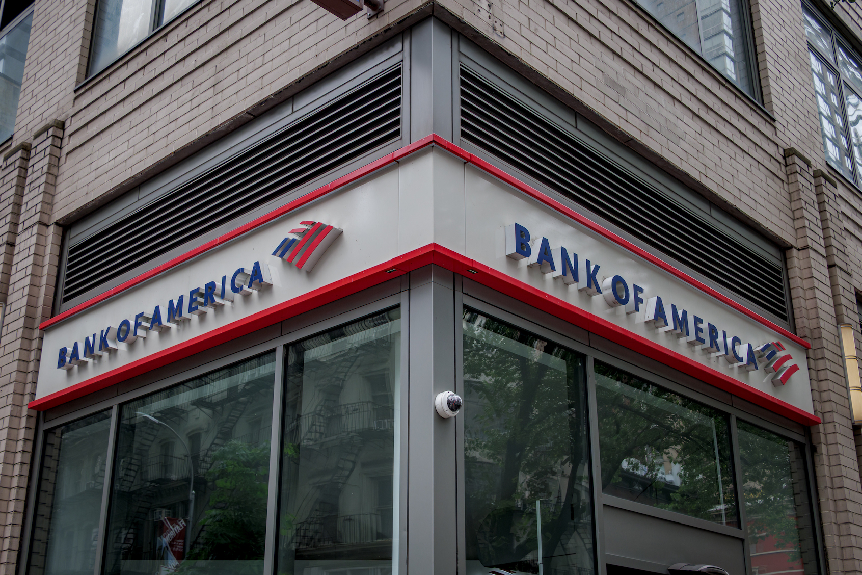 Sign at the entrance to a Bank of America branch in Midtown Manhattan. (Photo by Erik McGregor/Getty Images)