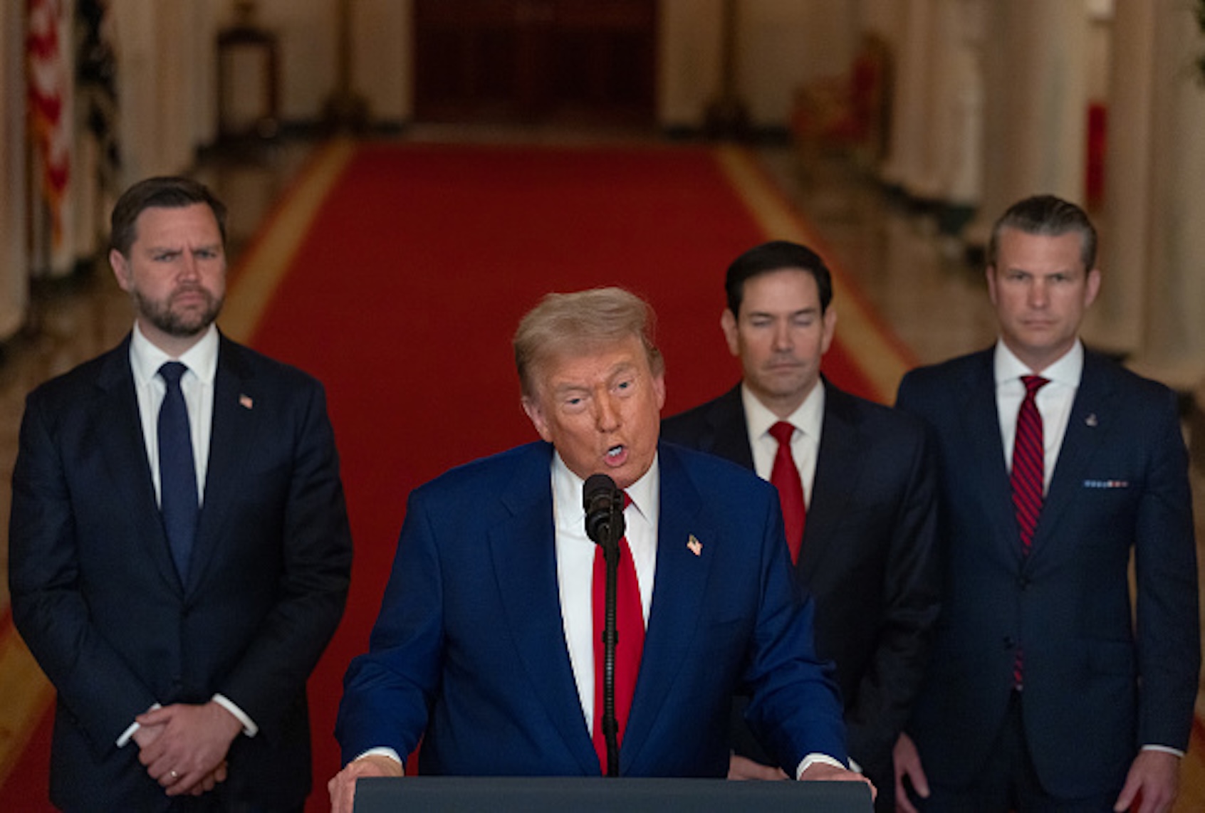 U.S. President Donald Trump delivers an address to the nation accompanied by U.S. Vice President JD Vance, U.S. Secretary of State Marco Rubio and U.S. Defense Secretary Pete Hegseth from the White House on June 21, 2025 in Washington, D.C. President Trump addressed the three Iranian nuclear facilities that were struck by the U.S. military early Sunday. (Carlos Barria - Pool/Getty Images)