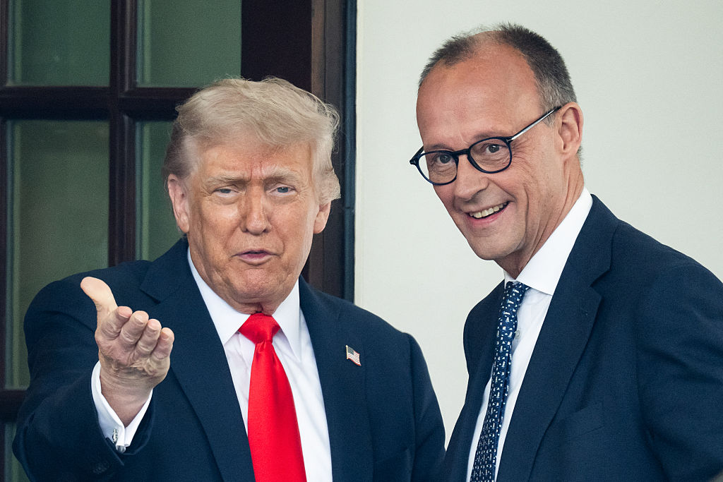 Donald Trump greets German Chancellor Friedrich Merz upon arrival at the White House, June 5, 2025. (Saul Loeb/AFP via Getty Images)