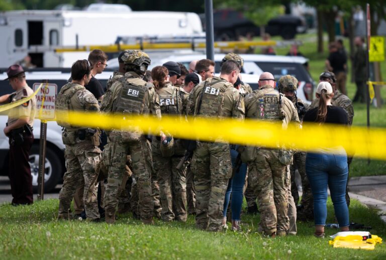 FBI agents search for suspect Vance Boelter on June 15, 2025 in Green Isle, Minnesota. (Stephen Maturen/Getty Images)