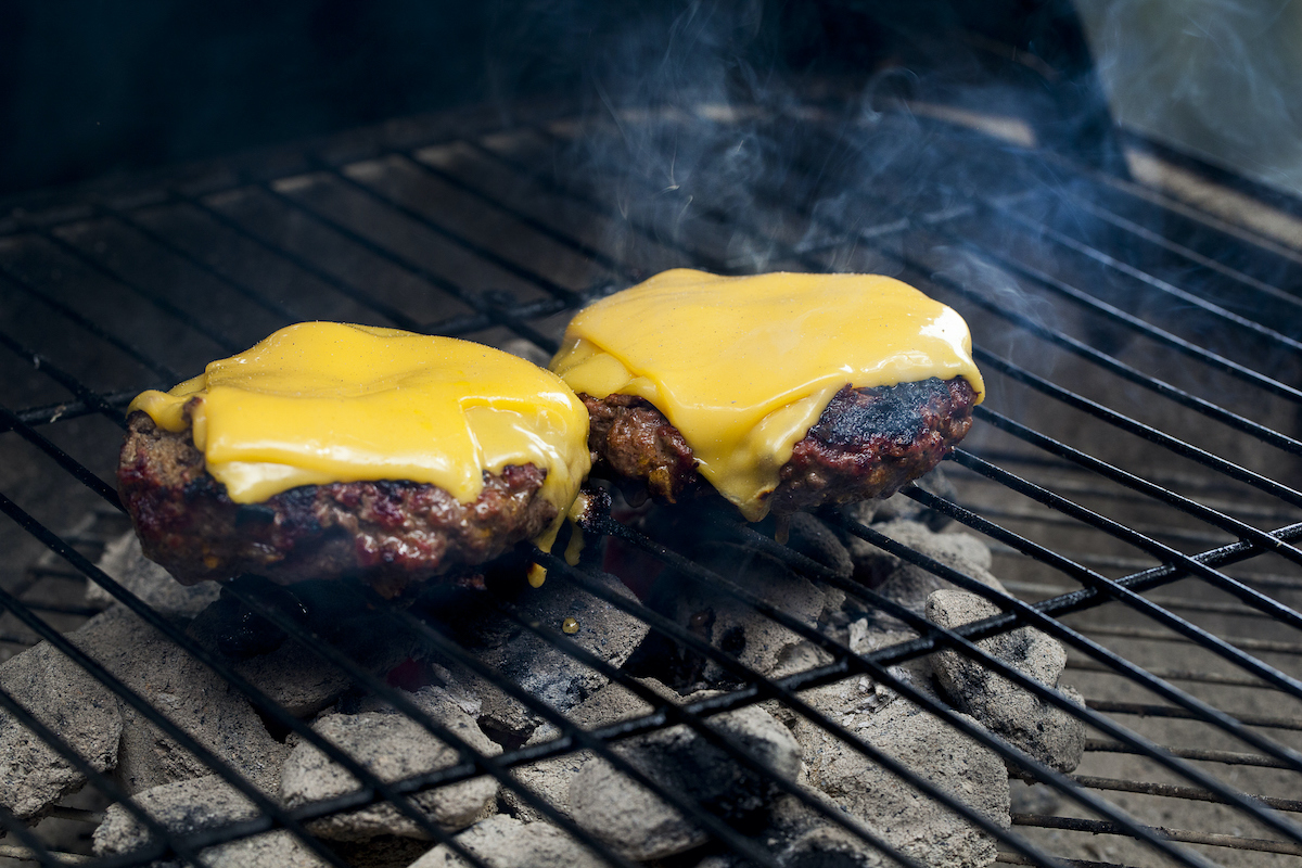 Burgers with American cheese (Ali Majdfar / Getty Images)