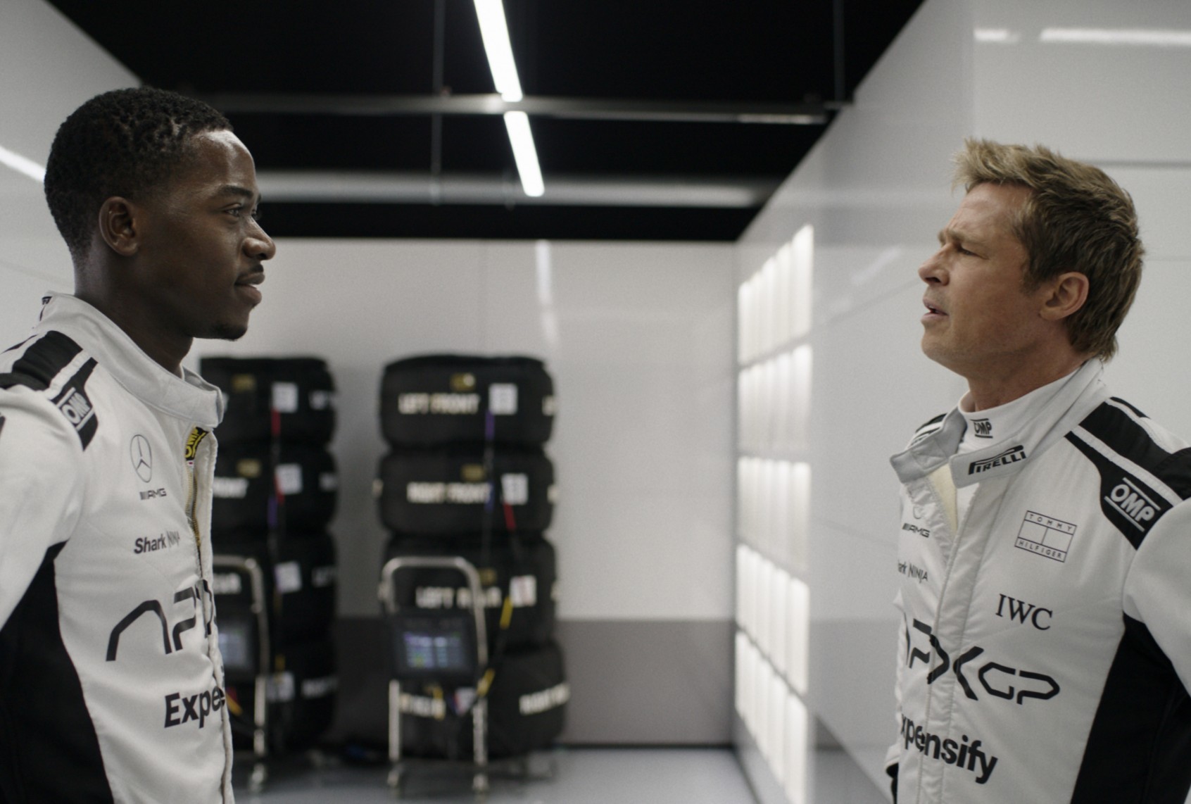 Damson Idris as Joshua Pearce and Brad Pitt as Sonny Hayes in "F1" (Warner Bros. Pictures / Apple Original Films)
